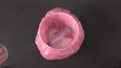 Plastic waste in a trash bin Stock Footage 112703412