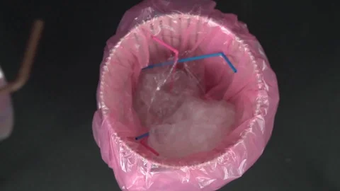 Plastic waste in a trash bin Stock Footage 114307341