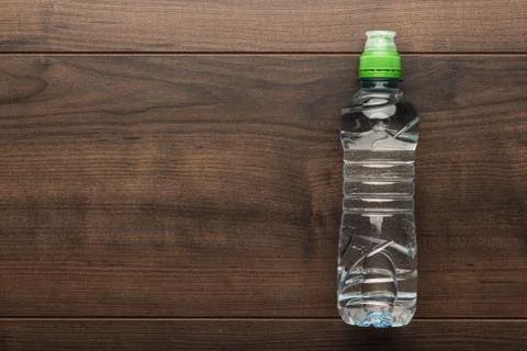 Plastic water bottle on the table Stock Photos