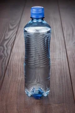 Plastic water bottle on the table Stock Photos