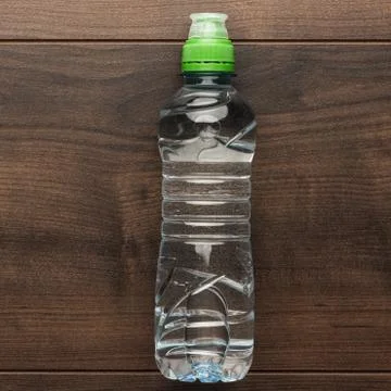 Plastic water bottle on the table Stock Photos