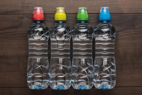 Plastic water bottle on the table Stock Photos