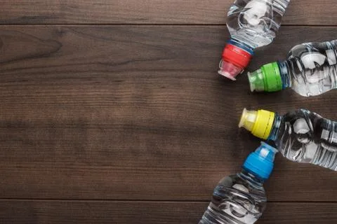 Plastic water bottle on the table Stock Photos