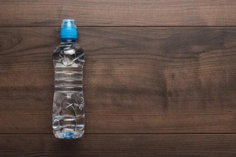 Plastic water bottle on the table Stock Photos