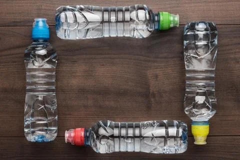 Plastic water bottle on the table Stock Photos