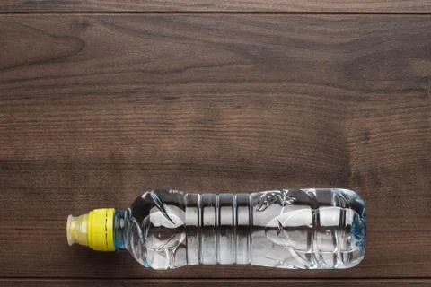 Plastic water bottle on the table Stock Photos