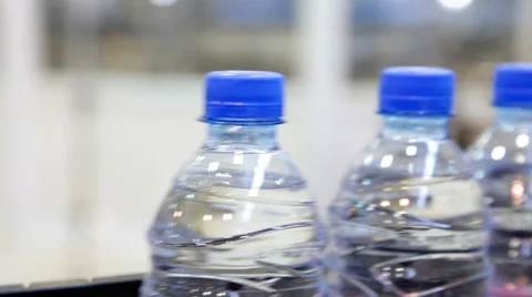 Small Water Plastic Bottle Rotates On Stock Footage Video (100%  Royalty-free) 15156688