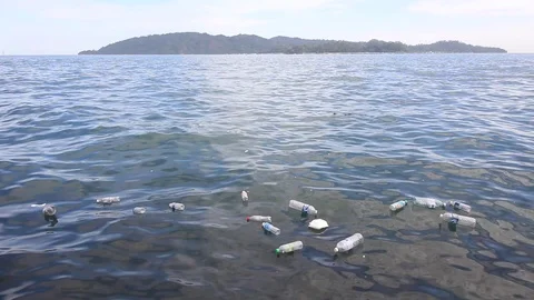 Plastic water bottles pollution in ocean Stock Footage 112771670