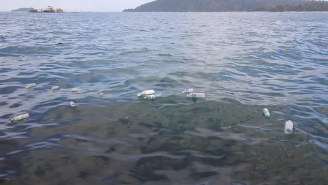Plastic water bottles pollution in ocean Video stock 112771758