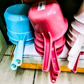 Plastic water dipper Stock Photos