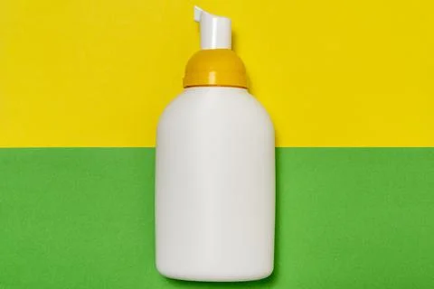 Plastic white bottle with dispenser pump Stock Photos