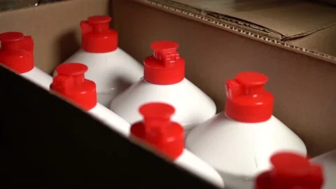 Plastic white bottles of detergent - cleaning products Stock Footage 143712605