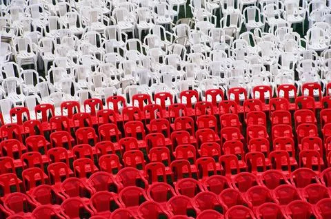Plastic white red chairs in open auditorium, Pune, Maharashtra, India Stock Photos