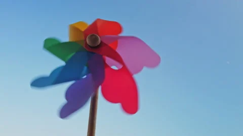 Plastic Windmill Toy Spinning With The Wind Stock Footage 203707108