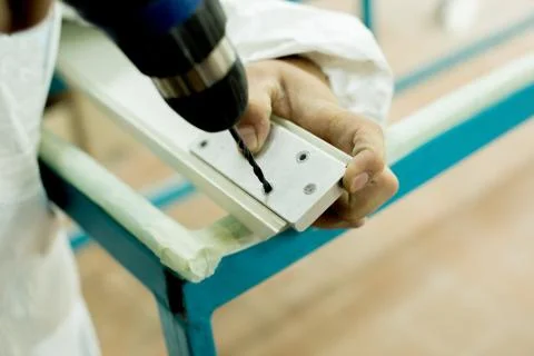 Plastic window assembly. Manufacture of plastic windows. Stock Photos