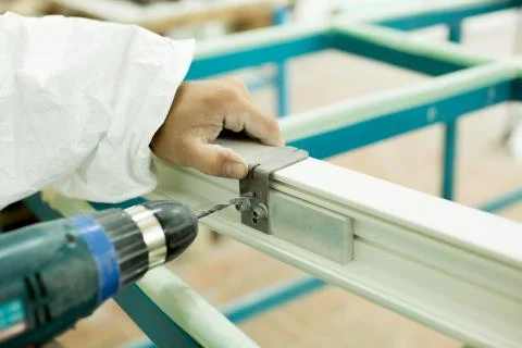 Plastic window assembly. Manufacture of plastic windows. Stock Photos