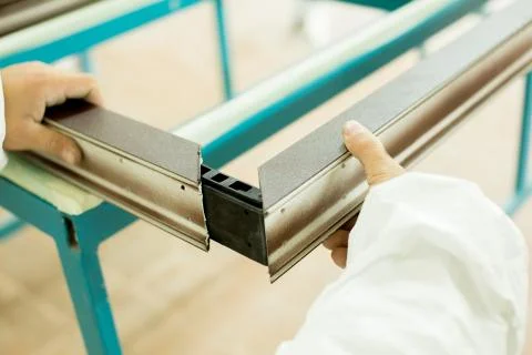 Plastic window assembly. Manufacture of plastic windows. Stock Photos