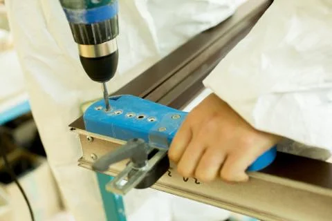 Plastic window assembly. Manufacture of plastic windows. Stock Photos
