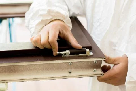 Plastic window assembly. Manufacture of plastic windows. Stock Photos