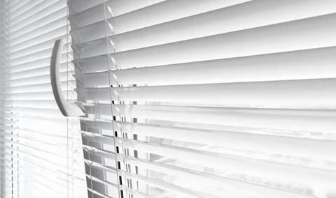Plastic window with blinds ajar for ventilation Stock Photos