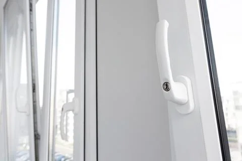 Plastic window handle close-up Stock Photos