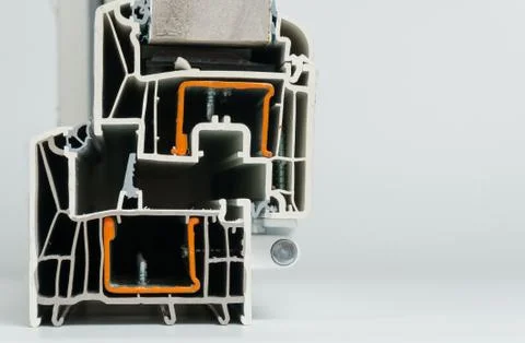 Plastic window profile. Windows section with triple glazing Stockfoto's