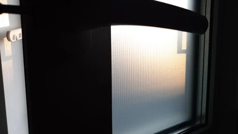 Plastic window. Window double-glazed windows. Light in the window. Stock-Footage 113397546
