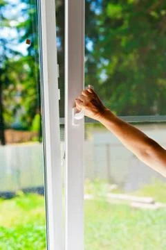Plastic windows with mosquito nets Stock Photos
