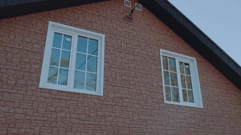 Plastic windows of a private two-storey house Stock Footage 194368313