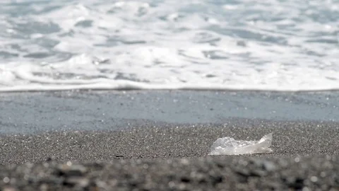 Plastic on the windswept beach Stock Footage 121090959