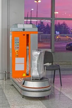 Plastic wrap luggage machine Stock Photos