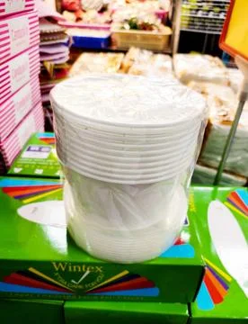 A plastic-wrapped stack of disposable paper cups Stock Photos