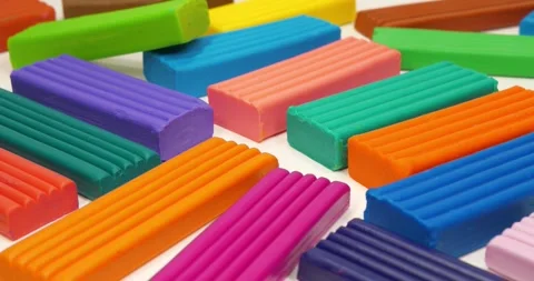 Plasticine blocks for fun and skillful modeling. Bright fun clay Stock Footage 339569765