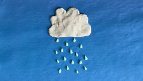 Plasticine cloud with fallin rain, timelapse video in cartoon style Stock Footage 271738262