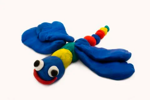 Plasticine dragonfly Stock Photos