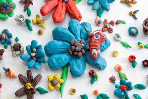 Plasticine flowers Stock Photos