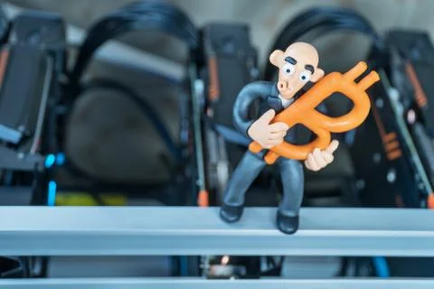 Plasticine man with bitcoin Stock Photos