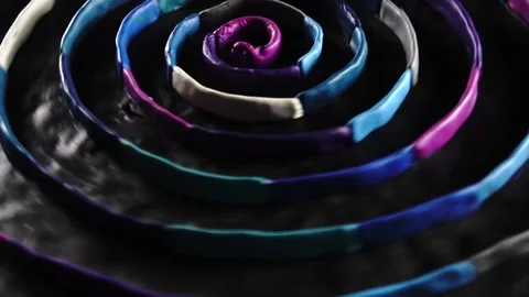 Plasticine texture spiral in motion Stockbeeldmateriaal 154428060