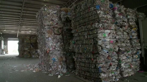Plastics and plastic container waste recycling warehouse Stock Footage 61323317