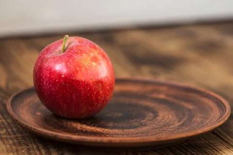 A plate with an apple Stock Photos