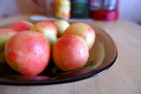 Plate with apricots Stock Photos
