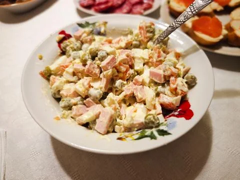 Plate with assorted appetizers on a festive table 库存照片