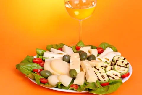 Plate with assorted cheese Фото