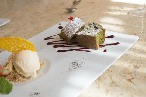 PLate with assorted desserts to share. Biscuit and ice cream Stock Photos