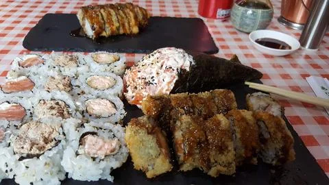 Plate of assorted sushi on the table Fotos de archivo