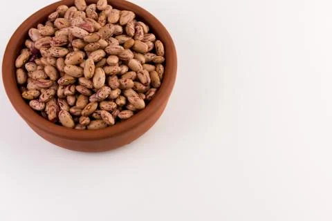 A plate of beans on white background Stock Photos