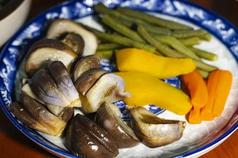 A Plate Of Boiled Vegetables On The Table Stock Photos