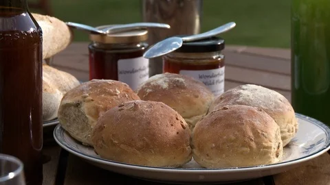 Plate Of Bread Rolls And Jam Stock Footage 115784534