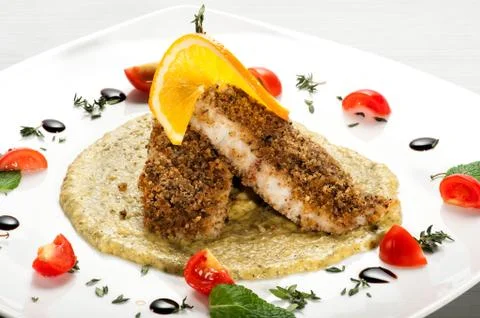 Plate of breaded fish fillets Stock Photos