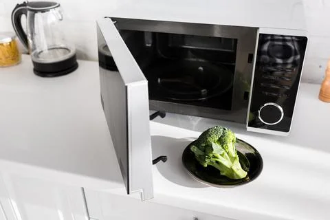 Plate broccoli plate microwave kitchen Stock Photos